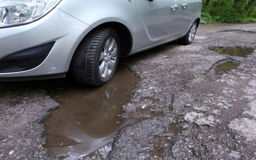 What Type of Damage Can a Pothole Accident Cause My Vehicle